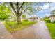 Inviting single-story home with a long driveway and fenced yard at 2726 Apache Dr, Anderson, IN 46012