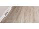 New wood-look flooring has a light finish and covers the entire room at 2726 Apache Dr, Anderson, IN 46012