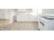 Kitchen featuring white cabinets, modern countertops, and stainless steel appliances at 2726 Apache Dr, Anderson, IN 46012