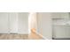 Open-concept living space featuring sleek floors and neutral paint at 2726 Apache Dr, Anderson, IN 46012