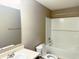 Bathroom featuring tub/shower combo with white subway tile and a single sink vanity at 276 Rocky Rd, Greenfield, IN 46140