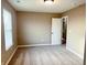 Bedroom featuring plush carpeting, a window providing natural light, and neutral paint at 276 Rocky Rd, Greenfield, IN 46140