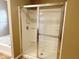 Bathroom featuring a modern and clean glass shower stall with a chrome shower head at 276 Rocky Rd, Greenfield, IN 46140