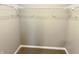 Empty walk-in closet featuring plush carpeting, wire shelving, and neutral paint at 276 Rocky Rd, Greenfield, IN 46140