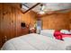 Bright bedroom featuring a dresser and tv with hardwood floors at 2781 E Vandalia Rd, Flat Rock, IN 47234