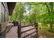 Spacious deck with grill, perfect for outdoor entertaining amid trees at 2781 E Vandalia Rd, Flat Rock, IN 47234