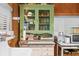 Bright kitchen featuring a farmhouse sink, cabinetry, and a microwave at 2781 E Vandalia Rd, Flat Rock, IN 47234