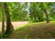 Scenic river view showcasing lush greenery and the river, creating a tranquil and picturesque setting at 2781 E Vandalia Rd, Flat Rock, IN 47234