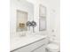 Bright bathroom with a modern vanity, decorative art, and a shower with a tub at 2922 Woods Edge Dr, Greenwood, IN 46143