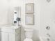 Bright bathroom featuring a modern vanity, neutral art, and a shower with a tub at 2922 Woods Edge Dr, Greenwood, IN 46143
