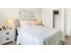 Bright bedroom with decor art, soft lighting, and closet space at 2922 Woods Edge Dr, Greenwood, IN 46143