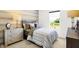 Comfortable bedroom with natural light, stylish furniture, and a scenic view at 2922 Woods Edge Dr, Greenwood, IN 46143