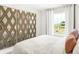 Bedroom with decorative mirrors, natural light, and relaxing scenic views at 2922 Woods Edge Dr, Greenwood, IN 46143