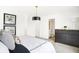 Bedroom with dark furniture, neutral carpet and walls and a partial view of the ensuite bathroom at 2922 Woods Edge Dr, Greenwood, IN 46143