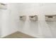 Organized walk-in closet with white shelving and multiple storage boxes at 2922 Woods Edge Dr, Greenwood, IN 46143