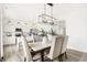 Bright and open dining area with adjacent kitchen and ample seating, ideal for Gathering gatherings at 2922 Woods Edge Dr, Greenwood, IN 46143
