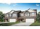 Charming new construction townhome featuring brick and siding with a two-car garage and beautiful landscaping at 2922 Woods Edge Dr, Greenwood, IN 46143