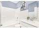 Clean bathroom featuring a shower-tub combo and white subway tile at 2948 Woods Edge Dr, Greenwood, IN 46143