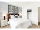 Inviting bedroom features a comfortable bed, modern lamps, and spacious closet at 2948 Woods Edge Dr, Greenwood, IN 46143