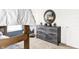 Bedroom with wooden bunk beds, dresser and a unique mirror at 2948 Woods Edge Dr, Greenwood, IN 46143