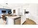 Open kitchen view with stainless steel appliances, and light, airy feel with dining and living room view at 2948 Woods Edge Dr, Greenwood, IN 46143