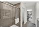 A bathroom featuring a glass shower enclosure and a doorway to a bedroom at 3104 Glasgow Pl, Danville, IN 46122