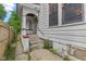 A classic home featuring a covered side entry and concrete steps at 3134 N College Ave, Indianapolis, IN 46205