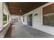 A covered front porch featuring neutral paint and the home's address at 3134 N College Ave, Indianapolis, IN 46205