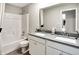 Modern bathroom with a double sink vanity, light gray countertop, and tile flooring at 3200 Glasgow Pl, Danville, IN 46122