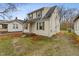 Charming two-story home with siding, green shutters, and small porch at 3305 N Arlington Ave, Indianapolis, IN 46218