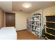 Spacious basement area offers ample storage with shelving units and bins at 3514 Summerfield Dr, Indianapolis, IN 46214