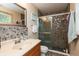 Well-maintained bathroom featuring tile flooring, a glass door shower, and vanity with sink at 3514 Summerfield Dr, Indianapolis, IN 46214