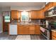 Well-equipped kitchen offers wood cabinets, modern appliances, and a functional layout for enjoyable cooking at 3514 Summerfield Dr, Indianapolis, IN 46214