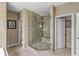This bathroom showcases a corner shower enclosure with a built-in bench and tile flooring at 3655 Copperleaf Blvd, Greenwood, IN 46143