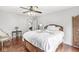 Bright bedroom with hardwood floors and decorative accents at 3655 Copperleaf Blvd, Greenwood, IN 46143