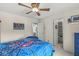 bedroom with a bright window, access to bathroom and walk-in closet at 3655 Copperleaf Blvd, Greenwood, IN 46143
