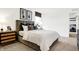Well-lit bedroom with a comfortable bed, tasteful decor, and neutral color scheme at 3671 Pinnacle Dr, Bargersville, IN 46106