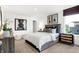 Stylish bedroom with a comfortable bed, accent furniture, and natural light from the window at 3671 Pinnacle Dr, Bargersville, IN 46106