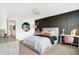 Beautiful bedroom with modern accent wall, desk, chair, and contemporary decor, flooded with natural light at 3671 Pinnacle Dr, Bargersville, IN 46106