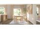 Inviting dining room featuring a modern table, wooden chairs, and natural light at 3866 Andean Ct, Bargersville, IN 46106