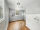 This bedroom has two windows and hardwood floors at 401 Harlan St, Indianapolis, IN 46201