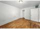 This bedroom has hardwood floors and light-colored walls at 401 Harlan St, Indianapolis, IN 46201