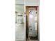 HVAC system is seen through a doorway with a view of the kitchen at 401 Harlan St, Indianapolis, IN 46201