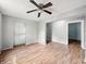 Living room with hardwood floors and ceiling fan at 401 Harlan St, Indianapolis, IN 46201