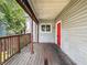 Inviting covered porch, perfect for relaxing and enjoying the outdoors at 401 Harlan St, Indianapolis, IN 46201