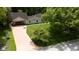 Aerial view of the property with a long driveway and mature trees at 445 W 63Rd St, Indianapolis, IN 46260