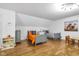 Spacious bedroom with hardwood floors, two beds and whimsical decor at 445 W 63Rd St, Indianapolis, IN 46260