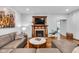 Inviting living room features hardwood floors, a fireplace, and cozy seating for relaxing and entertaining at 445 W 63Rd St, Indianapolis, IN 46260
