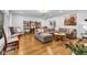 Spacious living room boasts hardwood floors, ample seating, and stylish decor for comfortable entertaining at 445 W 63Rd St, Indianapolis, IN 46260