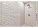 Modern bathroom features a fully tiled shower with dual shower heads and a built-in niche for toiletries at 445 W 63Rd St, Indianapolis, IN 46260